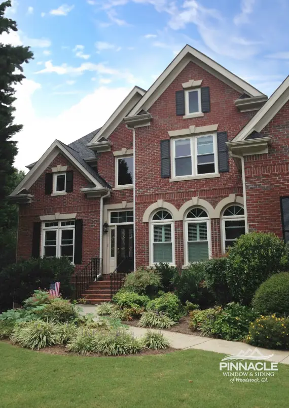 brick home with new windows